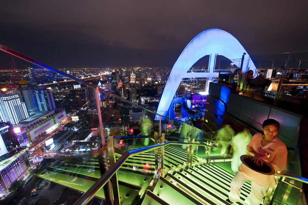 Bangkok Best rooftop Bars Grand & Bangkok Convention Centre at CentralWorld - Red Sky blue lit with waitress