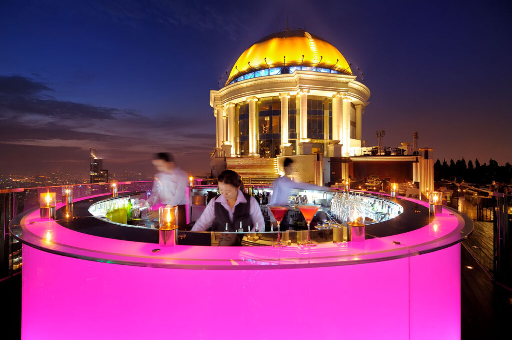 Bangkok-Best-rooftop-Bars-Sky-Bar-by-Lebua-pink-bar-with-city-skyline-view