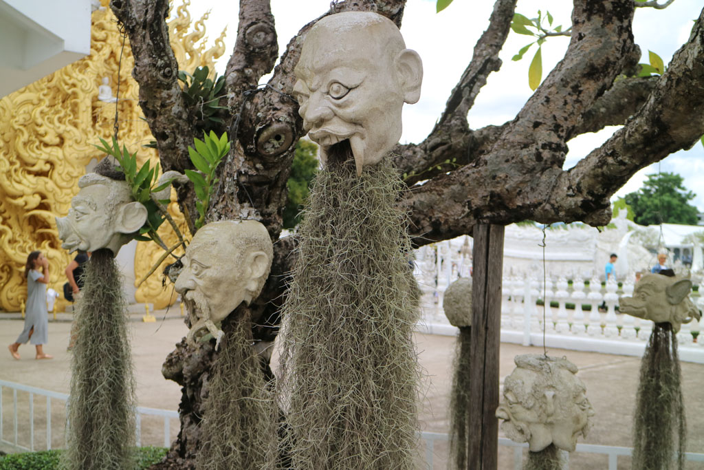 Chiang Rai White Temple heads_4785