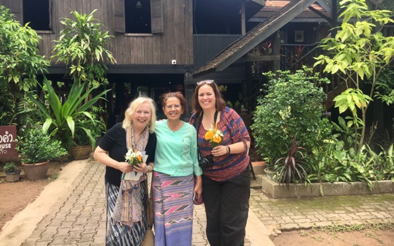 With-our-flower-cone-offerings-at-Hong-Chao-Fong-Kham-Folklore-Museum