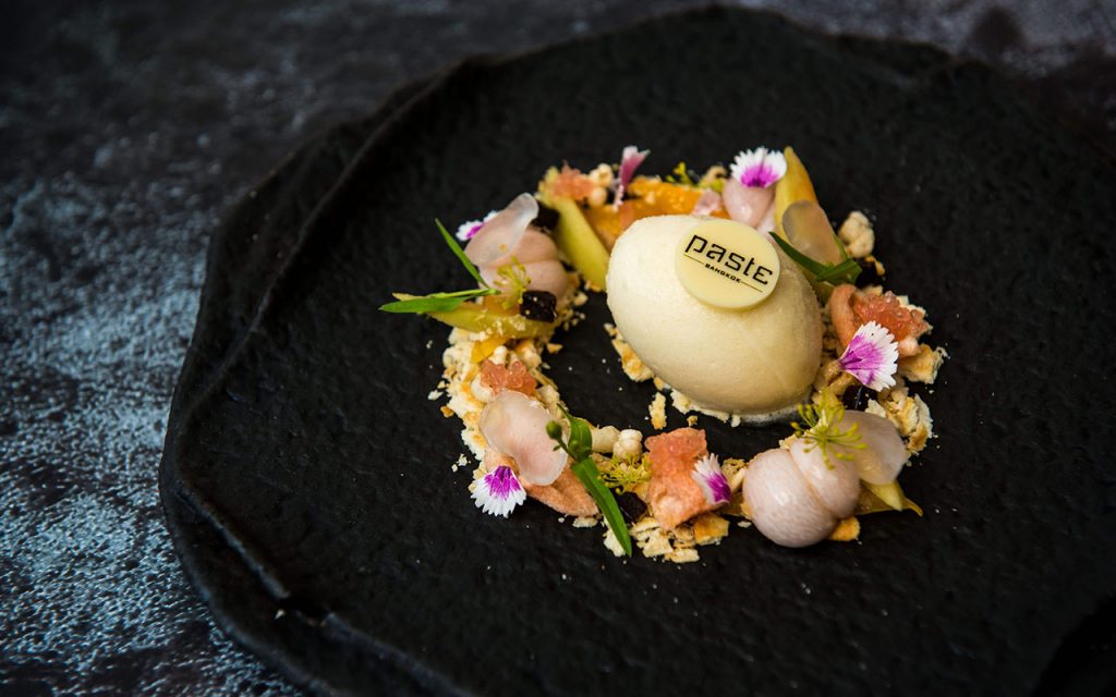 paste seasonal fruit platter with pineapple, pandanus, lemongrass sorbet, wood apple and calamansi lime coulis served with crispo kao hang